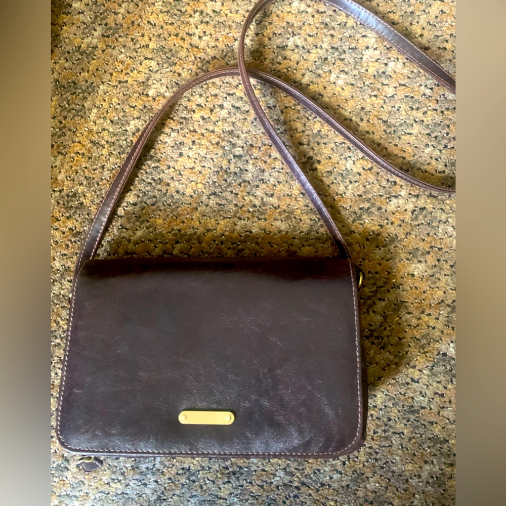 Small Purse with strap.  Color is brown